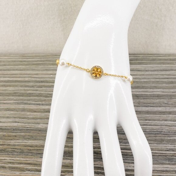 Tory Burch Crystal Logo & Imitation Pearl Station Bracelet Ivory/Tory Gold OS - Picture 10 of 16